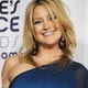 Kate Hudson poses with her award for Favorite Leading Lady at the 35th annual People's Choice awards in Los Angeles