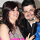 Manisha Ratnani and Dabboo Ratnani with their daughter