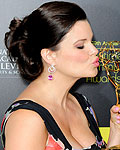 Actress Heather Tom wins an Emmy for 'Outstanding Actress in a Drama Series' at the 39th Daytime Emmy Awards