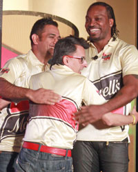 Mahendra Singh Dhoni and Chris Gayle