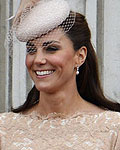 Prince Harry and Catherine, Duchess of Cambridge stand on the balcony of Buckingham Palace during the Queen's Diamond Jubilee in central Londo