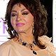 Actress Nabila Obaid arrives at 'Black Gold' world premiere during Doha Tribeca Film Festival Opening Night in Doha