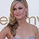 Julia Stiles poses as she arrives at the 63rd Primetime Emmy Awards in Los Angeles