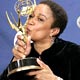 S Epatha Merkerson poses backstage with award at the 2005 Emmy Awards in Los Angeles.