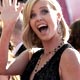 Actress Charlize Theron arrives at the 2005 Emmy Awards.