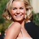 Rebecca Romijn of the the series Ugly Betty walks the red carpet at the 59th Primetime Emmy Awards