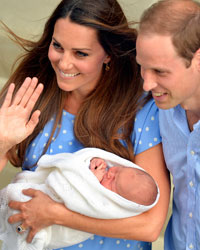 Britain's Catherine, Duchess of Cambridge, holds her baby son outside the Lindo Wing of St Mary's Hospital before leaving with Prince William, in central London