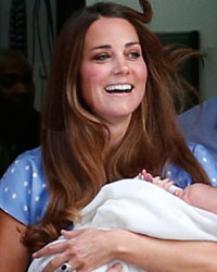 Britain's Prince William and his wife Catherine, Duchess of Cambridge appear with their baby son, outside the Lindo Wing of St Mary's Hospital, in central London