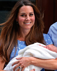 Britain's Prince William and his wife Catherine, Duchess of Cambridge appear with their baby son, outside the Lindo Wing of St Mary's Hospital, in central London