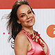 German actress Sonja Kirchberger poses on the red carpet as she arrives for the German Film Prize (Lola) ceremony in Berlin