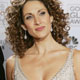 Actress Melina Kanakaredes poses backstage after presenting at the 62nd annual Golden Globe Awards 