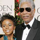 Actor Morgan Freeman poses with an unidentified woman during arrivals for the 62nd Annual Golden Globe Awards