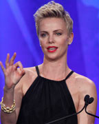 Actress Charlize Theron and actor Leonardo DiCaprio speak on stage during the 24th Annual GLAAD Media Awards at JW Marriott Los Angeles at L.A. LIVE in Los Angeles, California