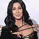 Cher stands backstage at the 67th annual Golden Globe Awards in Beverly Hills