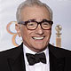 Director Martin Scorsese poses backstage after being awarded the Cecil B. DeMille Award at the 67th annual Golden Globe Awards