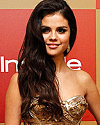 Selene Gomez poses at the InStyle/Warner Bros. after party following the 70th annual Golden Globe Awards in Beverly Hills