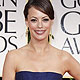 Berenice Bejo poses for photographers on the red carpet at the 69th annual Golden Globe Awards in Beverly Hills, California