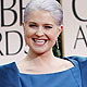 Kelly Osbourne poses as she arrives at the 69th annual Golden Globe Awards in Beverly Hills, California