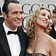 French actor Jean Dujardin and wife Alexandra Lamy arrive at the 69th annual Golden Globe Awards in Beverly Hills