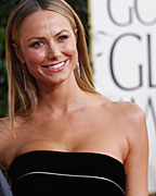 Actor George Clooney and Stacy Keibler arrive at the 70th annual Golden Globe Awards in Beverly Hills