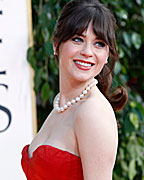 Actress Zooey Deschanel arrives at the 70th annual Golden Globe Awards in Beverly Hills