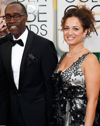 Actor Don Cheadle and his wife Bridgid Coulture arrive at the 71st annual Golden Globe Awards in Beverly Hills, California