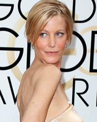 Actress Anna Gunn poses on arrival at the 71st annual Golden Globe Awards in Beverly Hills, California January