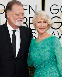 Actress Helen Mirren and husband, Taylor Hackford, arrive at the 71st annual Golden Globe Awards in Beverly Hills, California