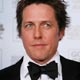 Hugh Grant poses backstage at the 64th annual Golden Globe Awards in Beverly Hills