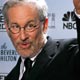 Steven Spielberg gestures backstage at the 64th annual Golden Globe Awards in Beverly Hills