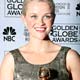 Actress Witherspoon poses with her award for Best Performance in a Motion Picture for 'Walk the Line' Golden Globe Awards