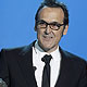 Spanish Alberto Iglesias holds his award for best original music at the Spanish Film Academy`s Goya awards ceremony in Madrid