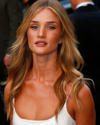 Model Rosie Huntington-Whiteley arrives for the GQ Men of the Year awards at the Opera House in London