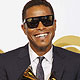 Maxwell holds his Grammy awards for best male R&B vocal performance and best R&B album at the 52nd annual Grammy Awards in Los Angeles