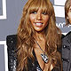 French producer David Guetta and his wife Cathy pose on the red carpet at the 52nd annual Grammy Awards in Los Angeles