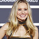 Actress Kristen Bell poses on the red carpet at the 52nd annual Grammy Awards in Los Angeles