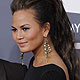 John Legend and Christine Teigen arrive at the 54th annual Grammy Awards in Los Angeles