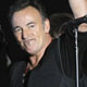 Bruce Springsteen waves after his performance at the 54th annual Grammy Awards in Los Angeles