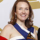 Sasha Cooke and Thomas Glenn hold awards backstage after winning 'Best Opera Recording' at the 54th annual Grammy Awards in Los Angeles