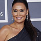 Actress Tia Carrere poses as she arrives at the 54th annual Grammy Awards in Los Angeles