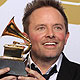 Chris Tomlin poses backstage after winning Best Contemporary Christian Music Album at the 54th annual Grammy Awards in Los Angeles