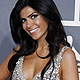 Actress Sheila Shah poses as she arrives at the 54th annual Grammy Awards in Los Angeles