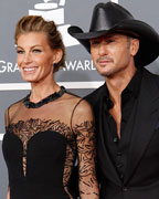 Country singers Faith HIll and her husband Tim McGraw arrive at the 55th annual Grammy Awards in Los Angeles, California