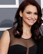 TV personality Jack Osbourne and his wife Lisa Stelly arrive at the 55th annual Grammy Awards in Los Angeles, California