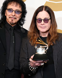 Musicians Tony Iommi, Ozzy Osbourne and Geezer Butler of Black Sabbath (L-R) pose with their award for Best Metal Performance for 'God is Dead?' at the 56th annual Grammy Awards in Los Angeles, California