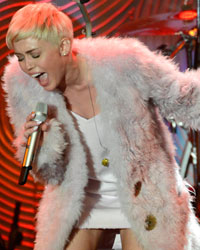 Miley Cyrus performs at the Clive Davis Pre-Grammy Gala and Salute to Industry Icons, honoring Universal Music Group Chairman and CEO Lucian Grainge, in Beverly Hills, California