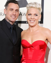 Pink arrives with her husband Carey Hart at the 56th annual Grammy Awards in Los Angeles, California