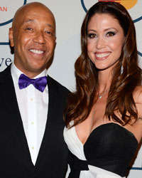 Russell Simmons and Shannon Elizabeth attend the Clive Davis Pre-Grammy Gala and Salute to Industry Icons, honoring Universal Music Group Chairman and CEO Lucian Grainge, in Beverly Hills, California