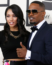 Actor and singer Jamie Foxx and Corinne Bishop arrive at the 56th annual Grammy Awards in Los Angeles, California