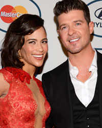 Paula Patton and Robin Thicke attend the Clive Davis Pre-Grammy Gala and Salute to Industry Icons, honoring Universal Music Group Chairman and CEO Lucian Grainge, in Beverly Hills, California